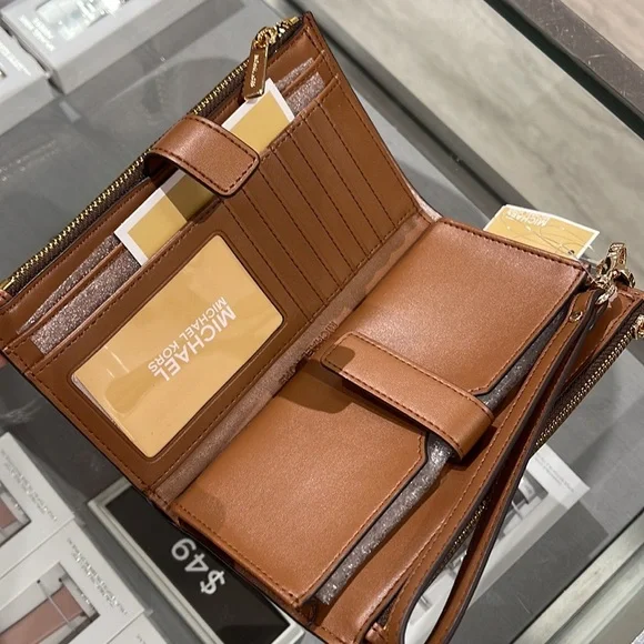 MICHAEL KORS LARGE DOUBLE ZIP WRISTLET PHONEHOLDER WALLET CLUTCH 
Brown - Picture 10 of 16